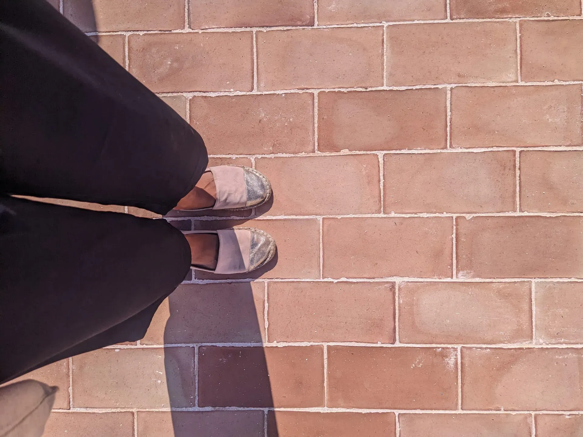 Handmade clay tiles, unique texture under natural light